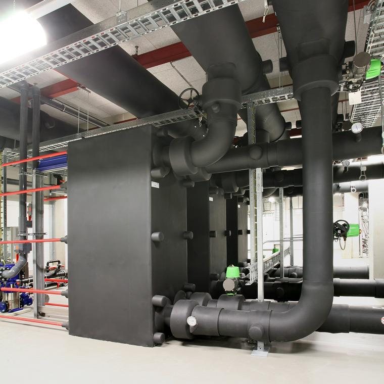 Lagged pipes and equipment in a mechanical room